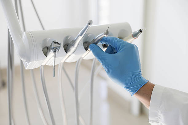Professional Tooth Extraction technician working in Davie, FL